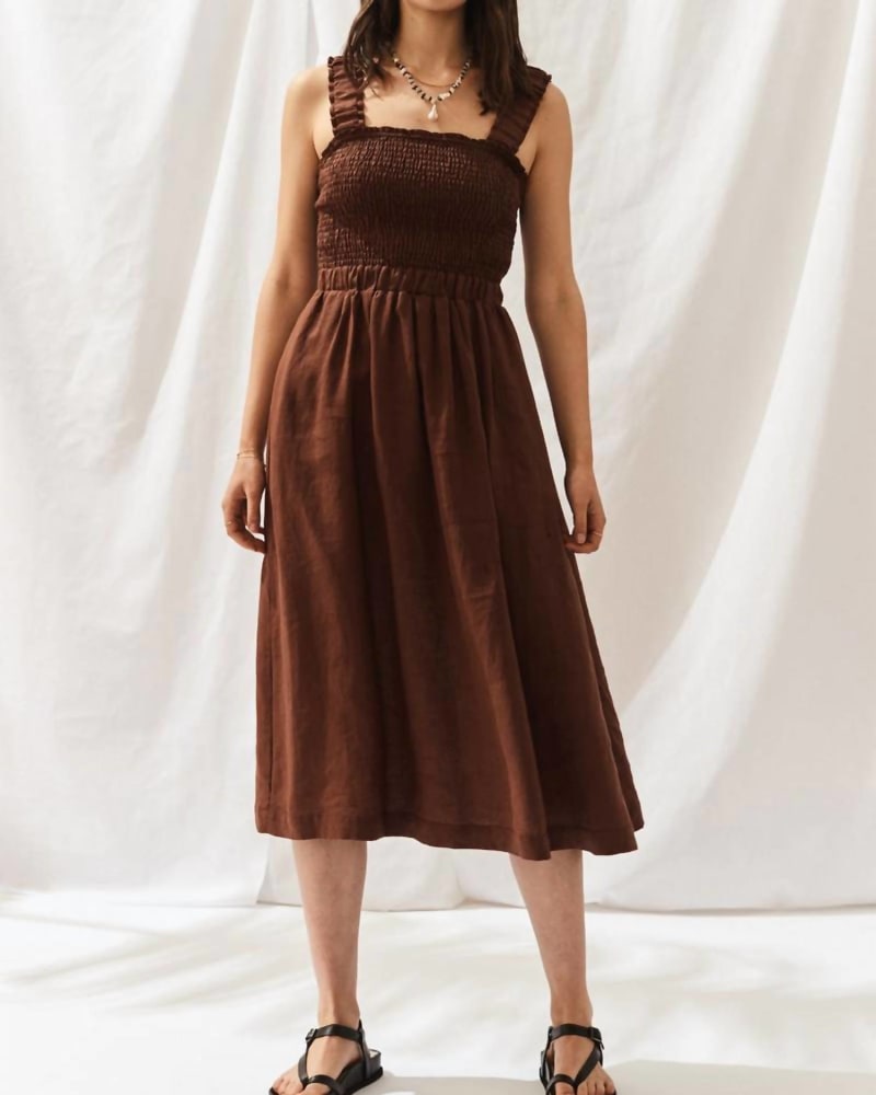 Front of a model wearing a size L Setrella Dress in Chocolate in Chocolate by Sancia. | dia_product_style_image_id:342729
